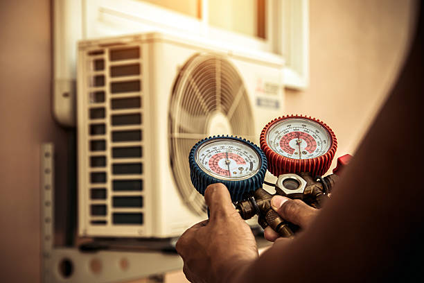 Professional Air Conditioning Service technician working in Solebury, PA